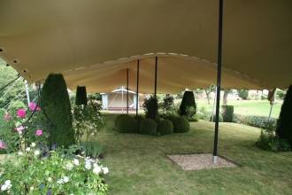 Wedding Ceremony Tent, Rigged over delicate rose garden, Oxford